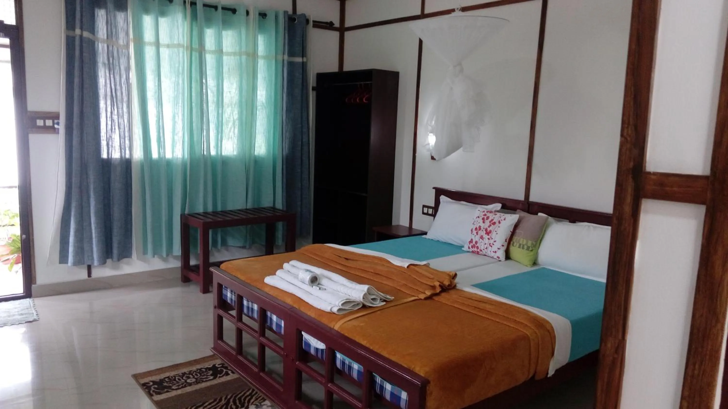Bed in Periyar Inn