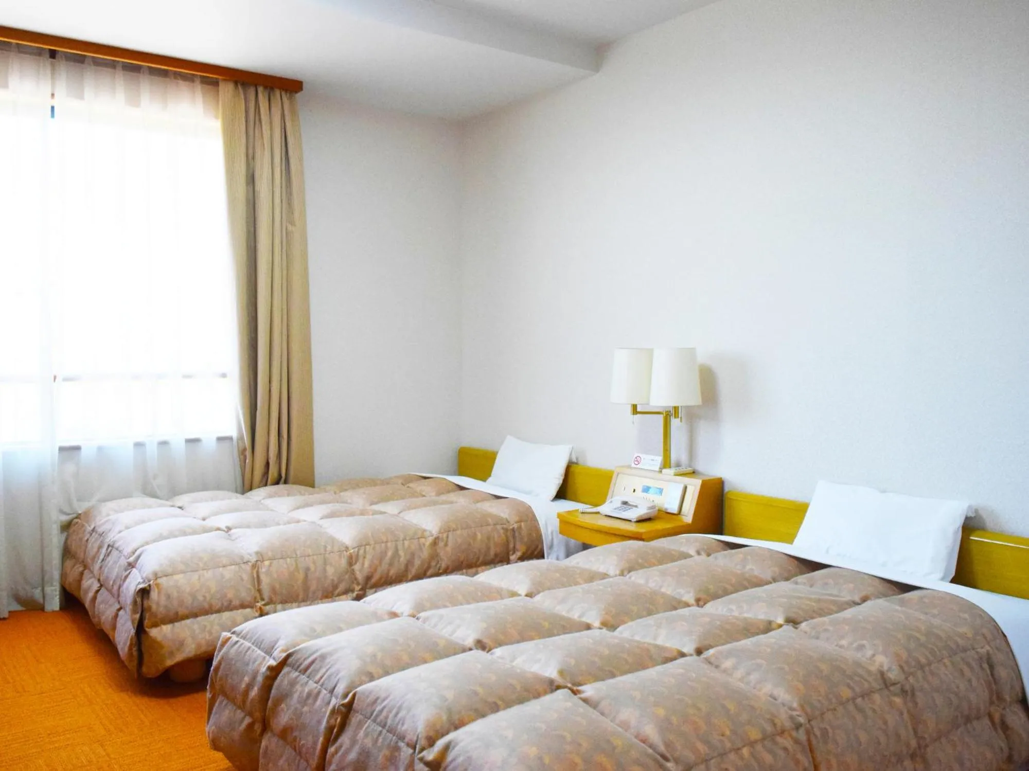 Bed in Hotel Gyokusen