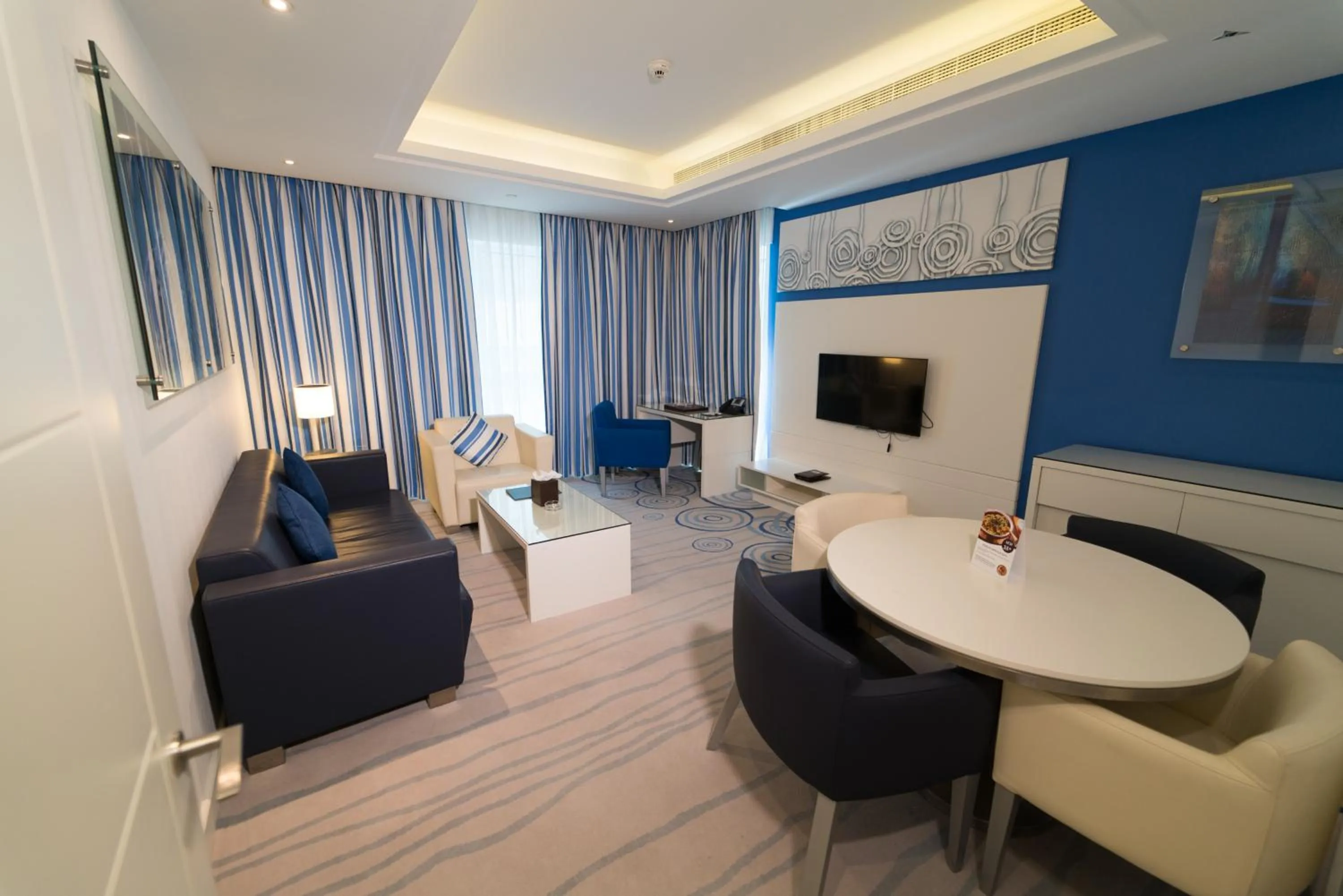 Living room, Seating Area in Golden Tulip Downtown Abu Dhabi