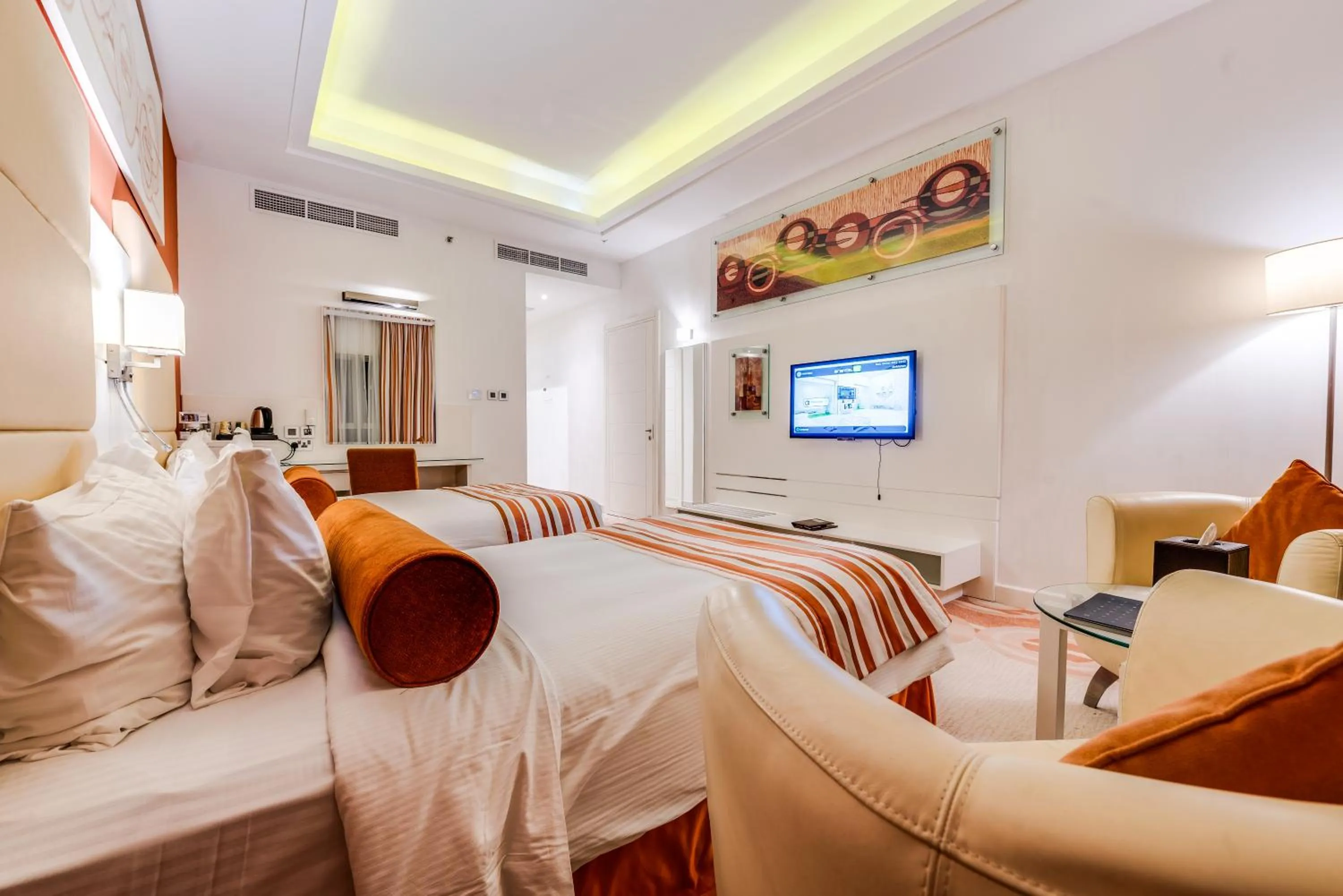 Photo of the whole room in Golden Tulip Downtown Abu Dhabi