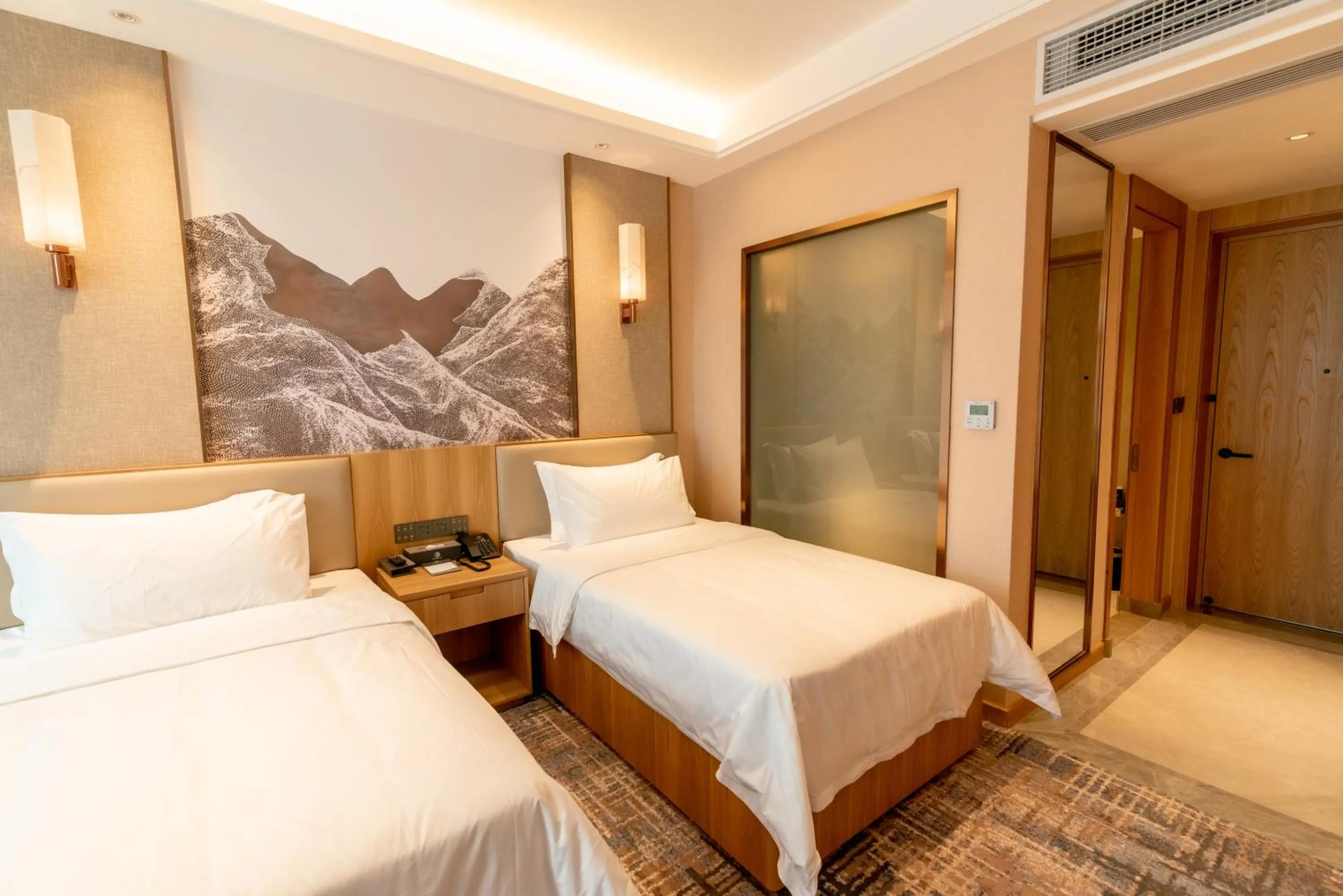 Bed in ShengDa International Hotel