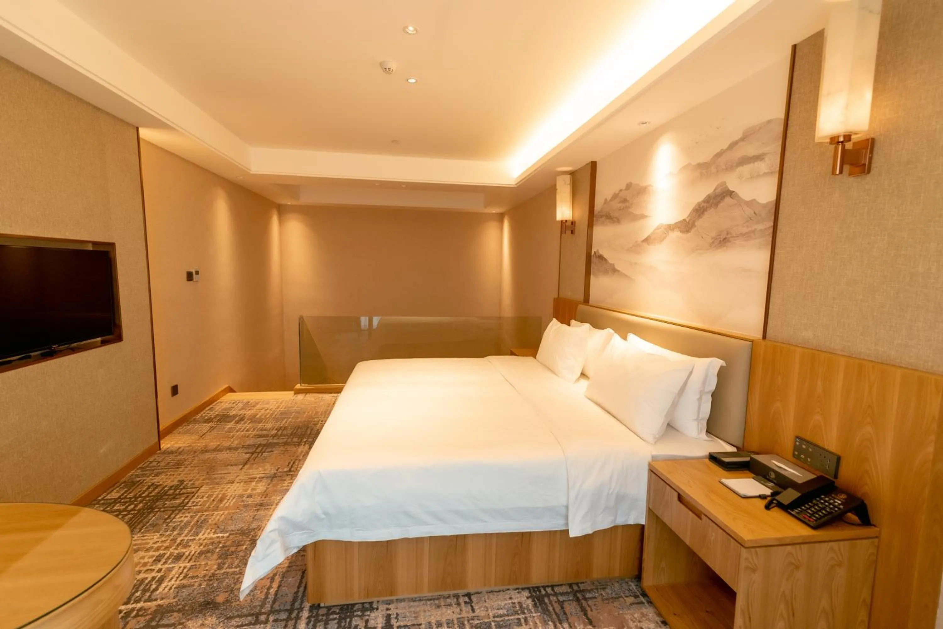 Bed in ShengDa International Hotel