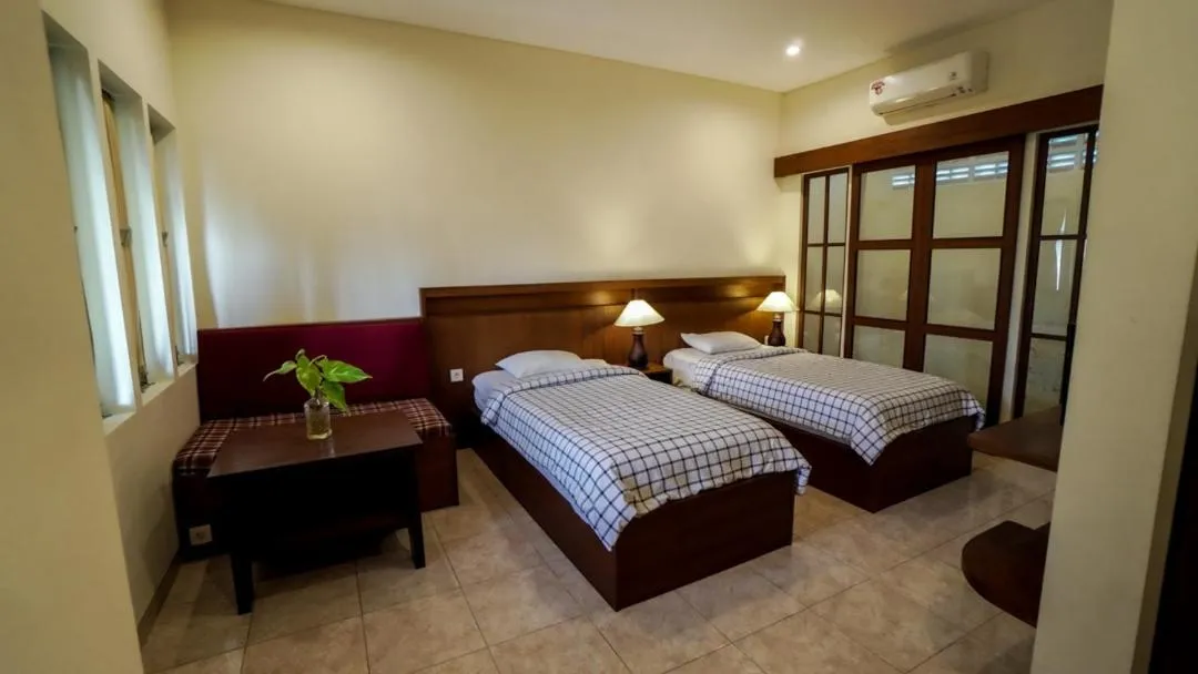 Seating area, Bed in The Janan Villa