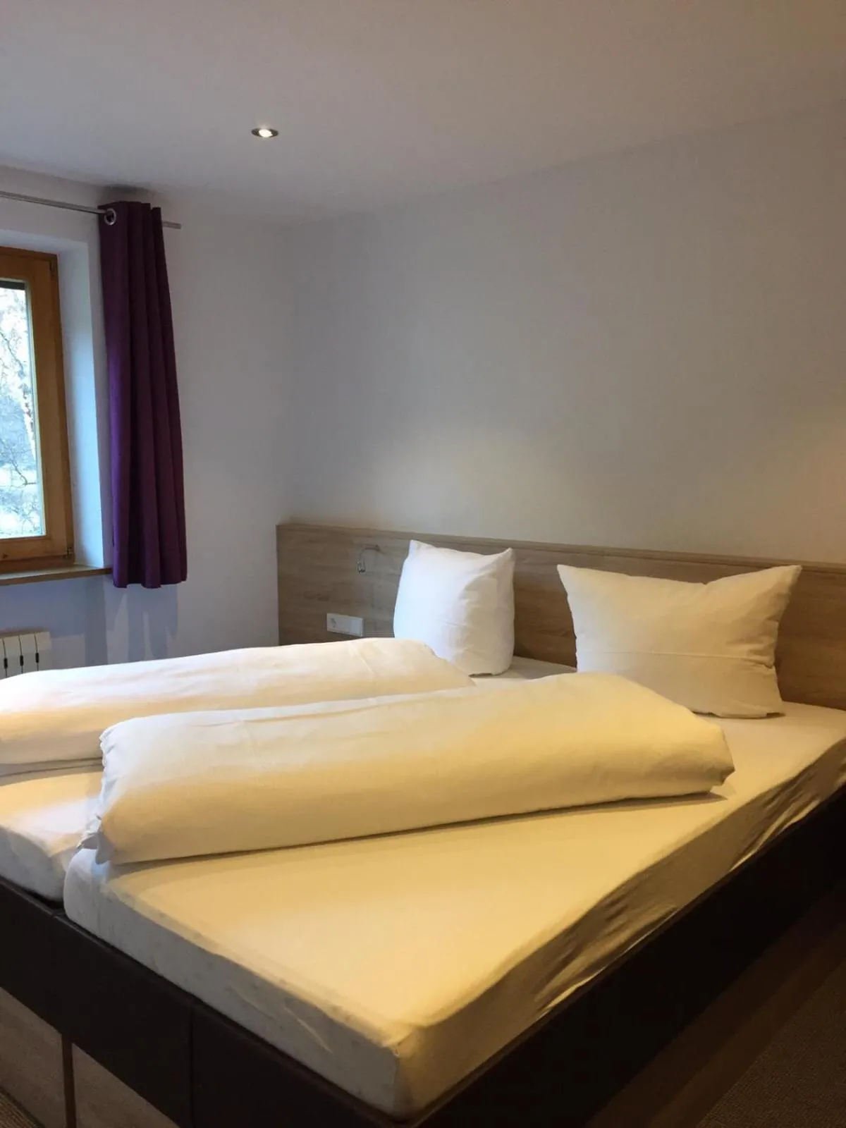 Bed in Ferienwohnungen Bailom
