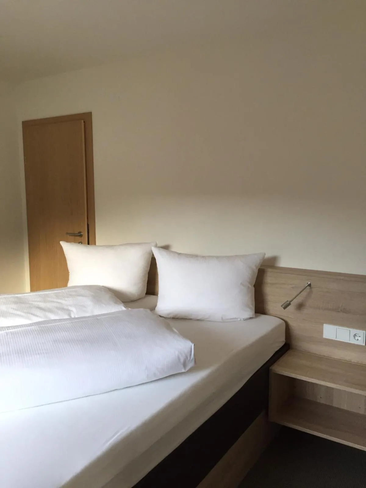 Bed in Ferienwohnungen Bailom