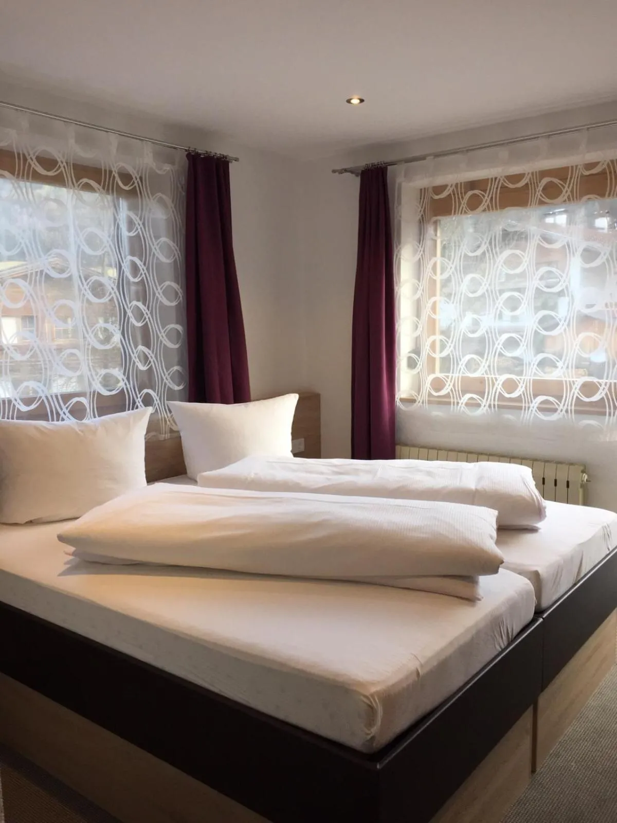 Bed in Ferienwohnungen Bailom