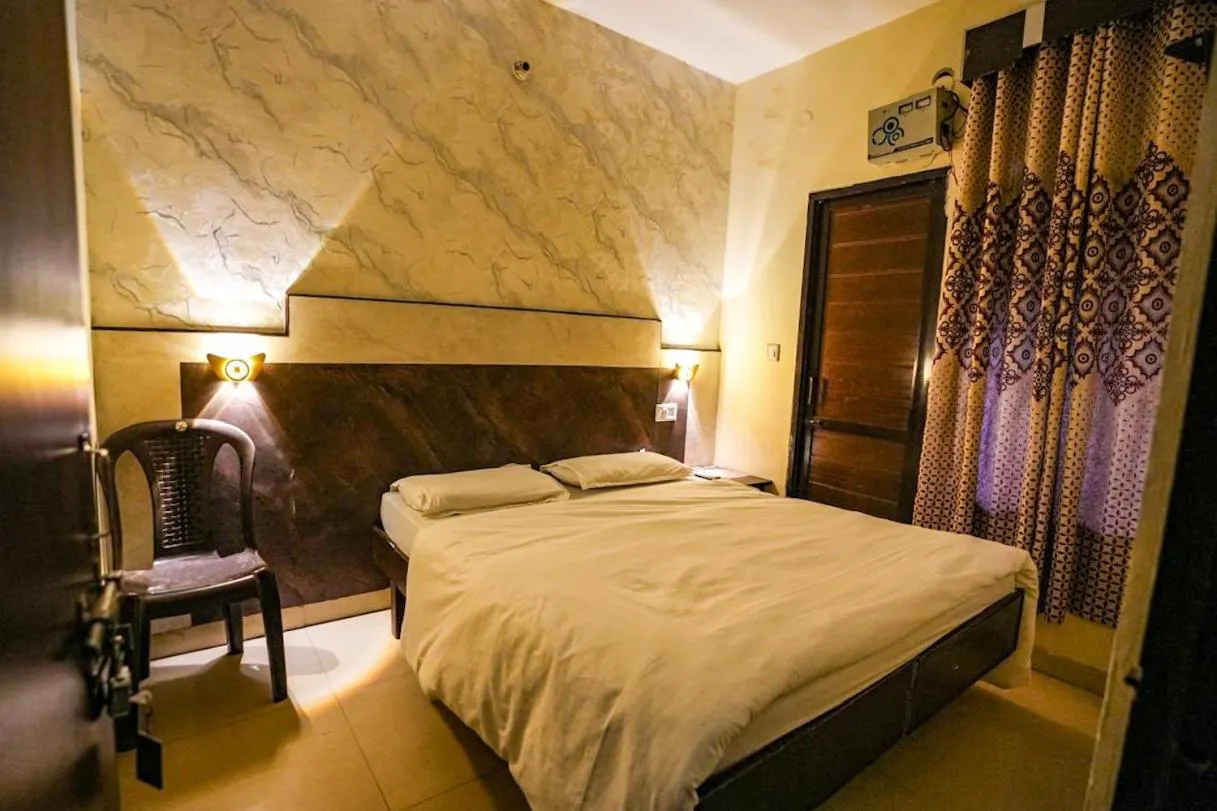 Bed in Hotel Blessing Inn