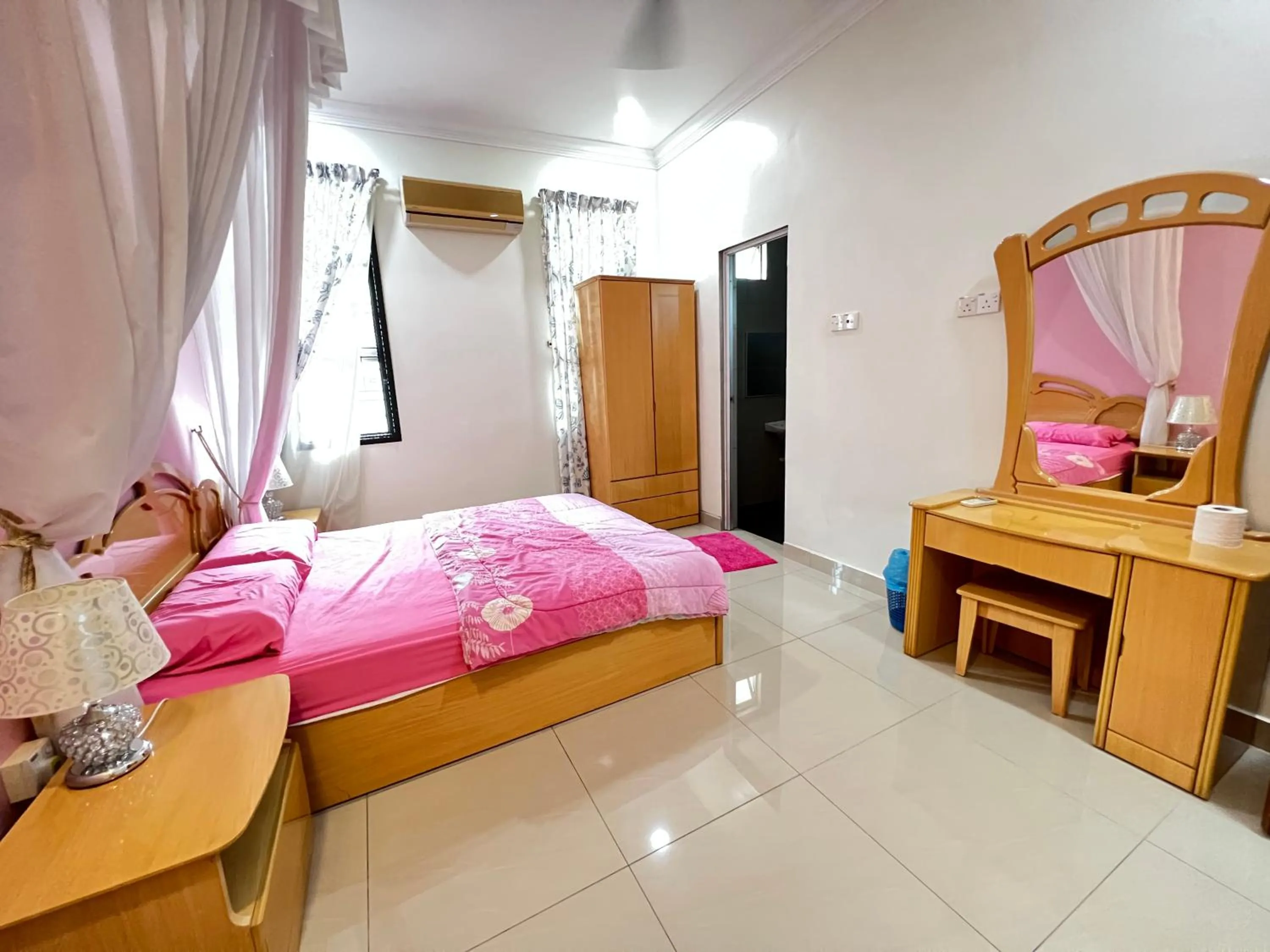 Bed in Jiaxin Homestay - Desa Terbau 家馨民宿