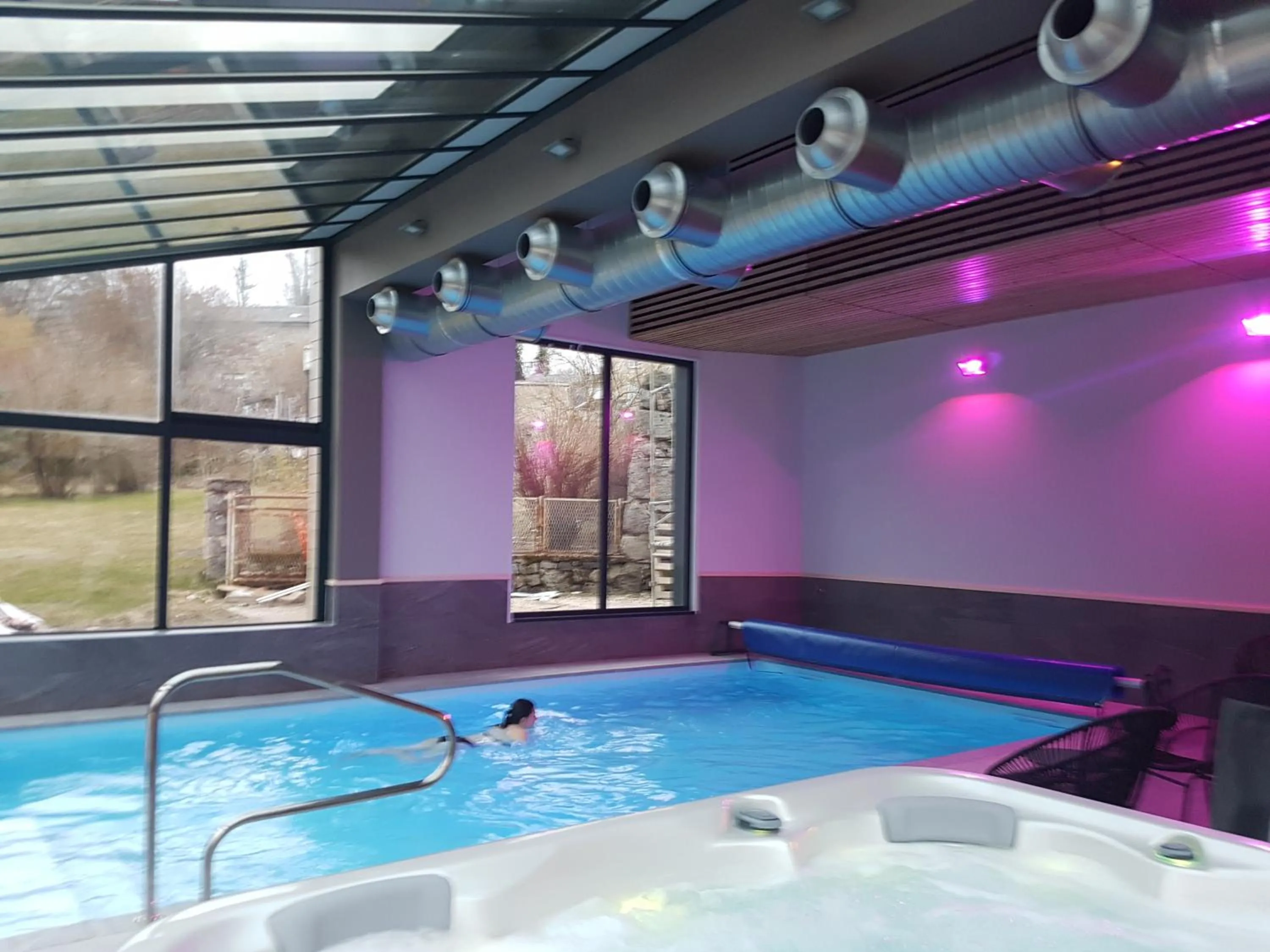 Swimming pool in Logis SPA Hotel Restaurant De La Poste