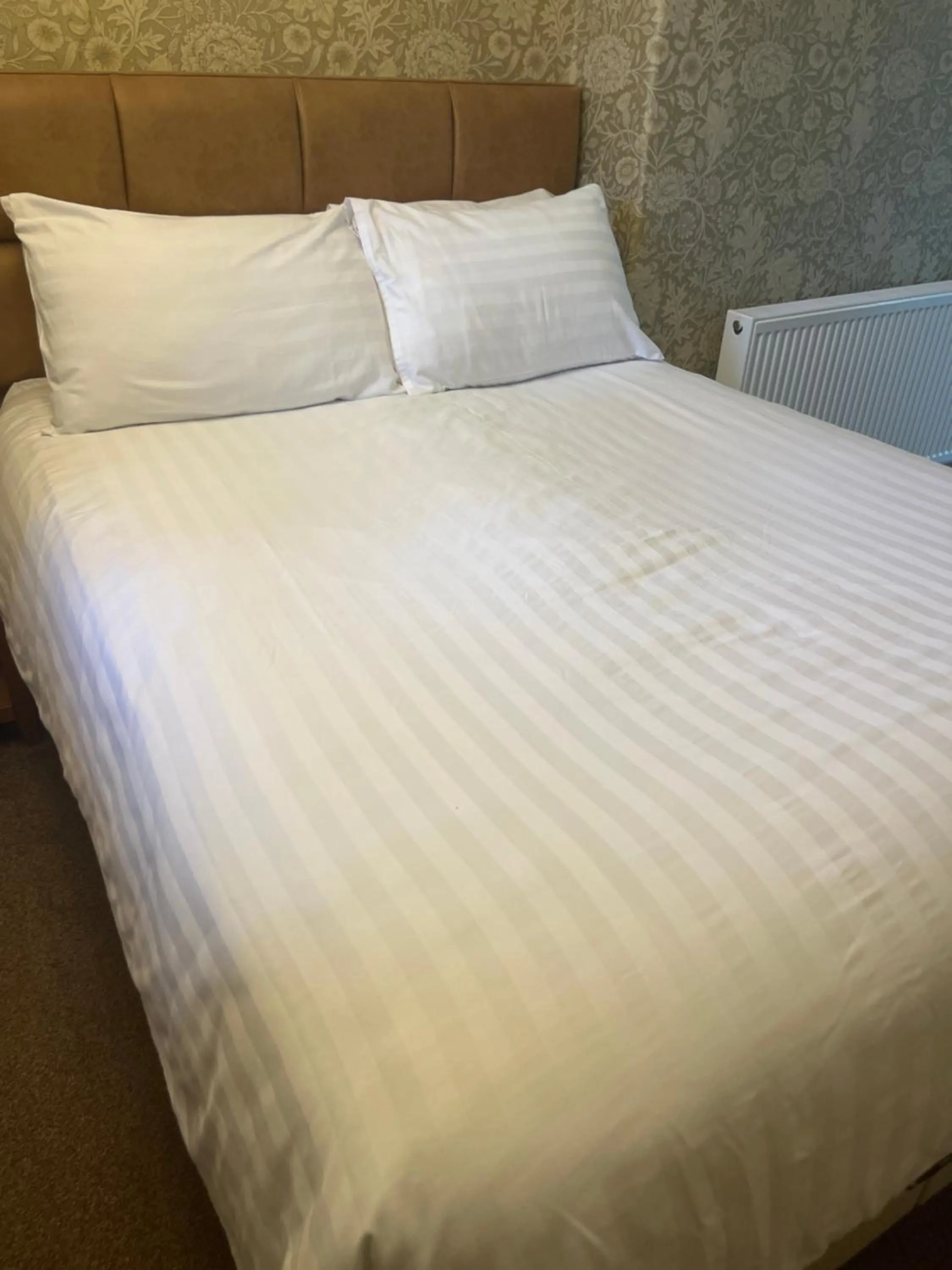 Bed in Ravenswood Guest House