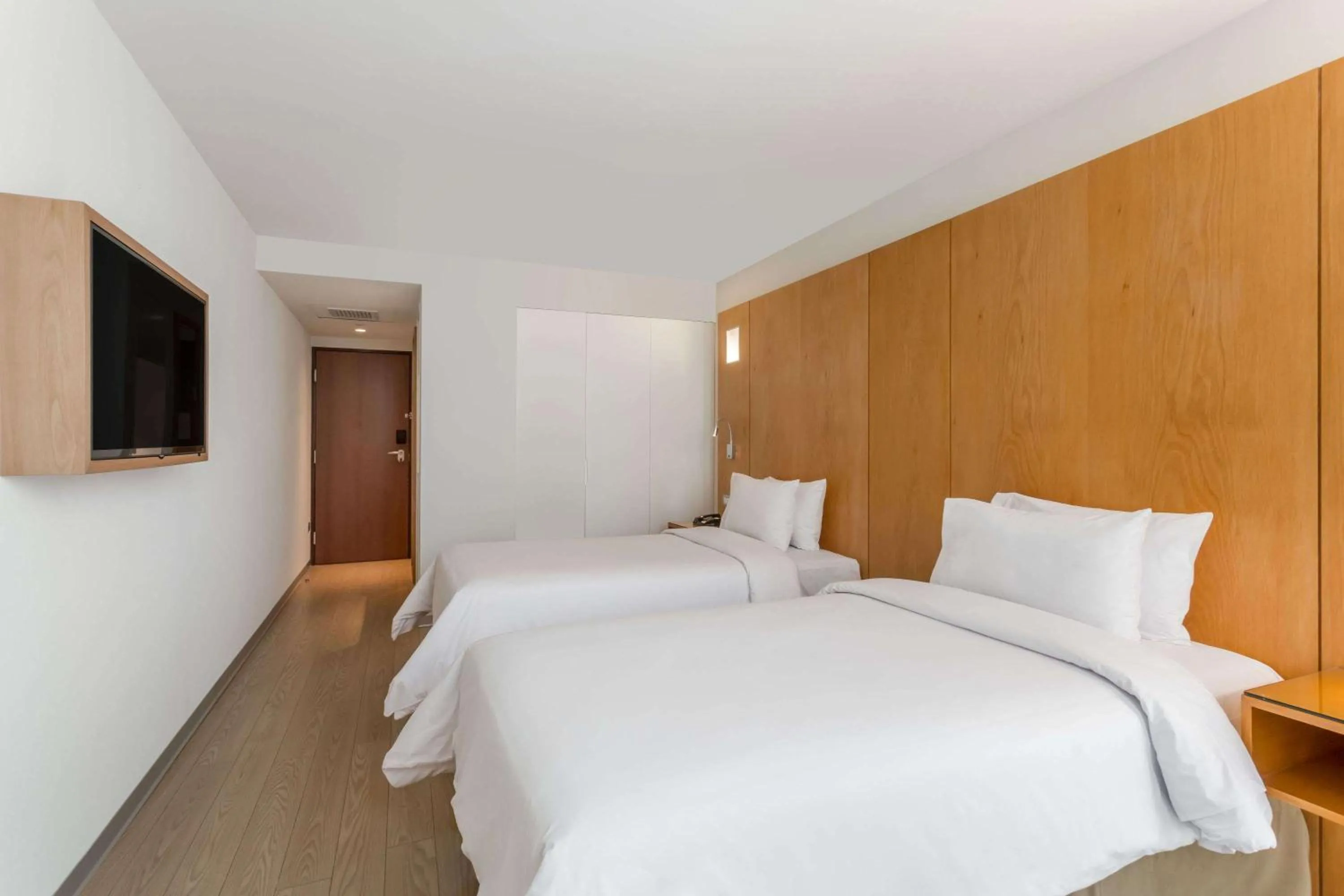 Photo of the whole room, Bed in Ramada Encore by Wyndham Lima San Isidro