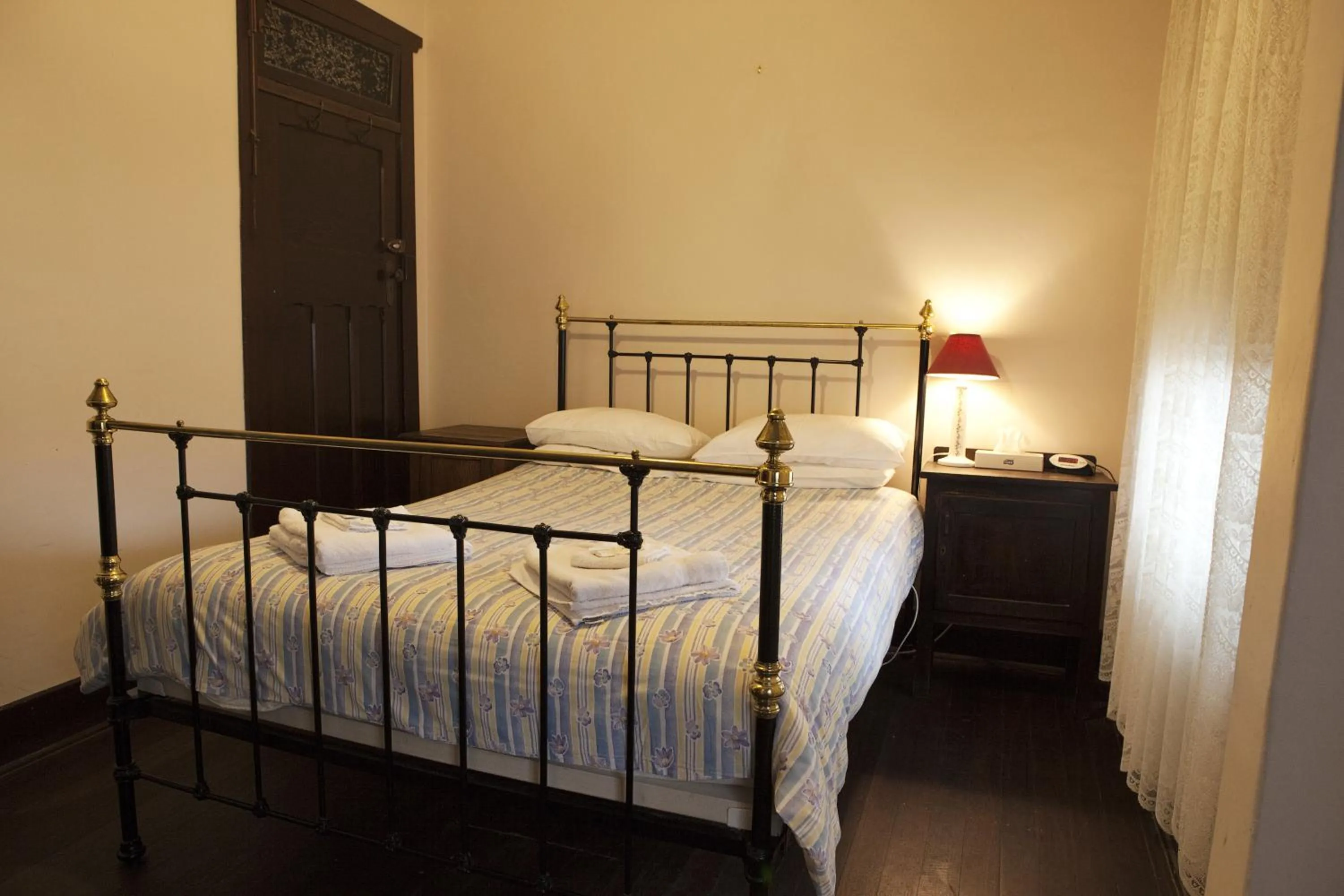 Bedroom in The Rising Sun Hotel