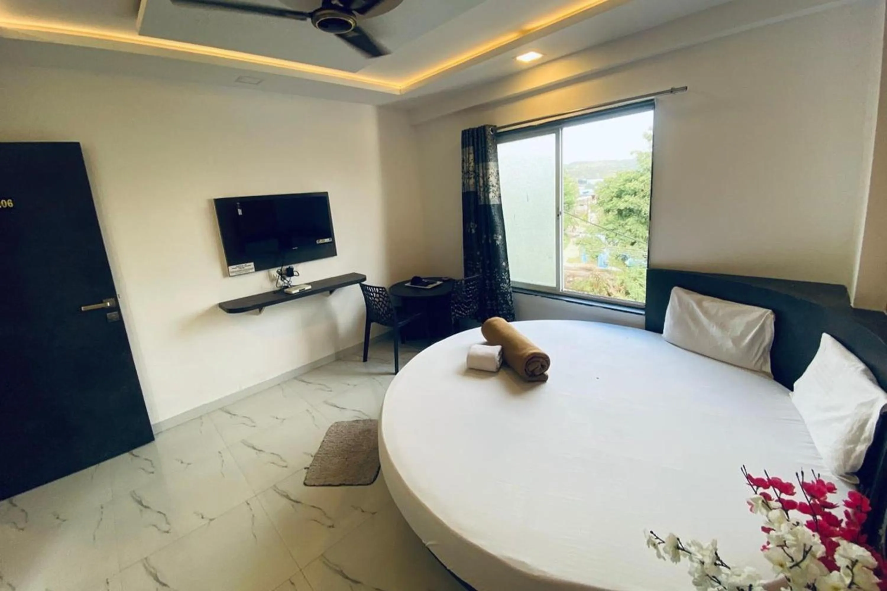 Bedroom in Sai Vishwa Lodging