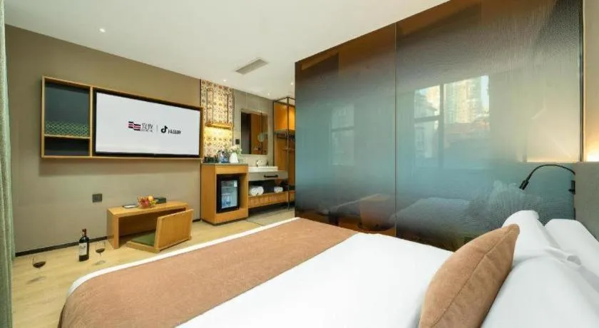 Bed in Yi Zhi Hotel -Beijing Road subway station, Dafo Temple, Guangzhou