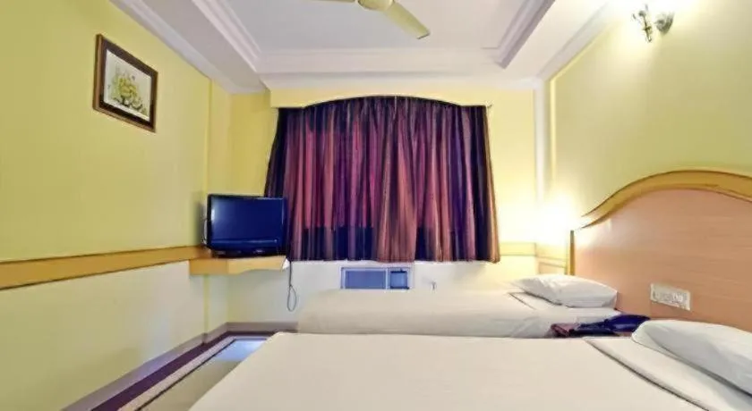 Bed in Hotel Nandhini Jayanagar