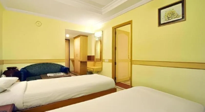 Bed in Hotel Nandhini Jayanagar