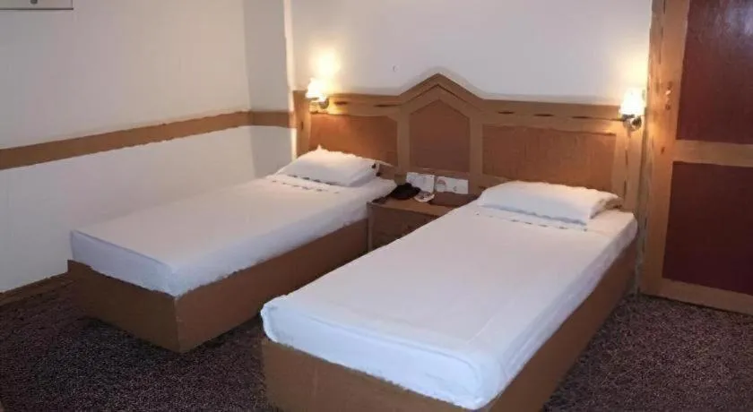 Bed in Hotel Nandhini Jayanagar