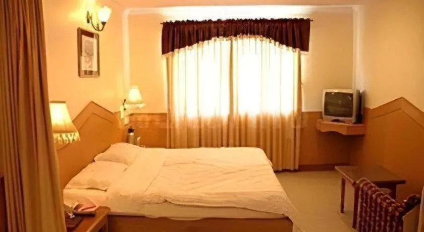 Bed in Hotel Nandhini Jayanagar