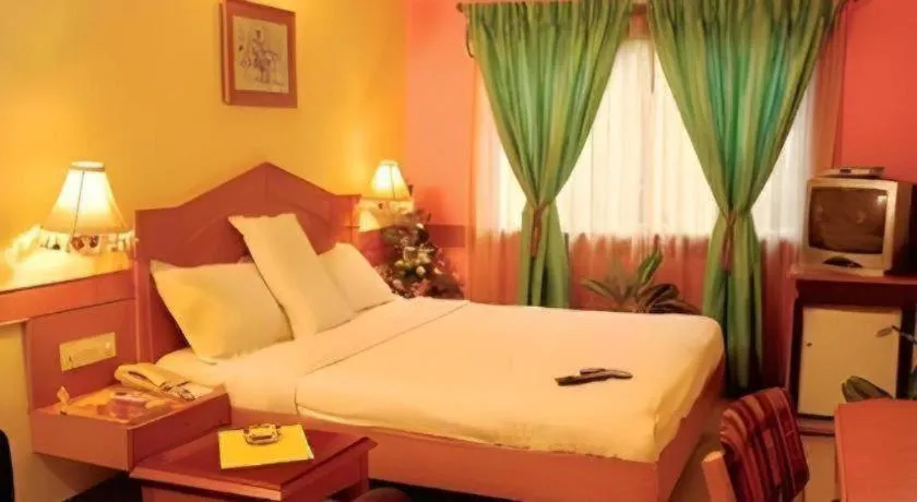 Bed in Hotel Nandhini Jayanagar