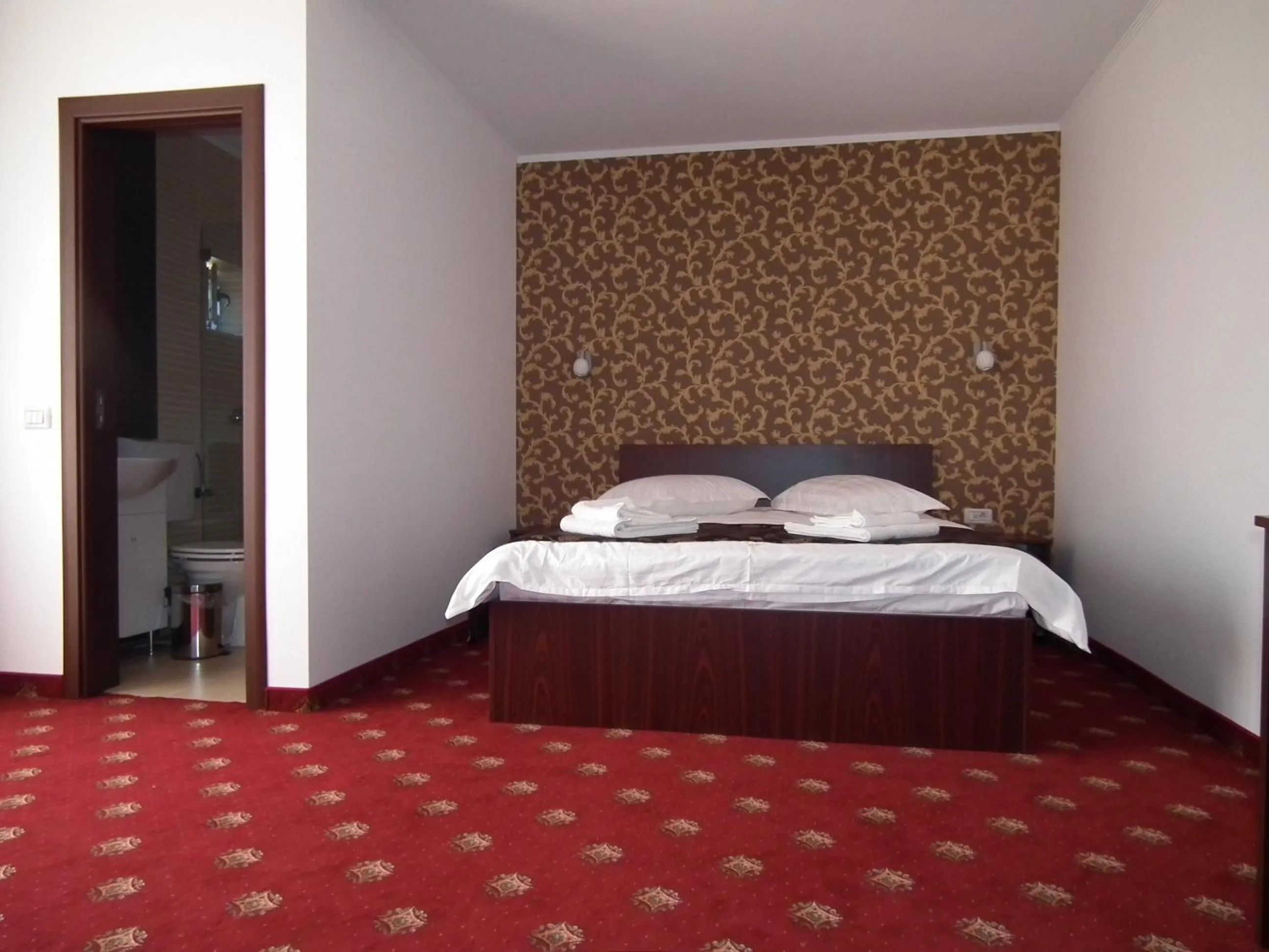 Bed in Vila Queen Mary