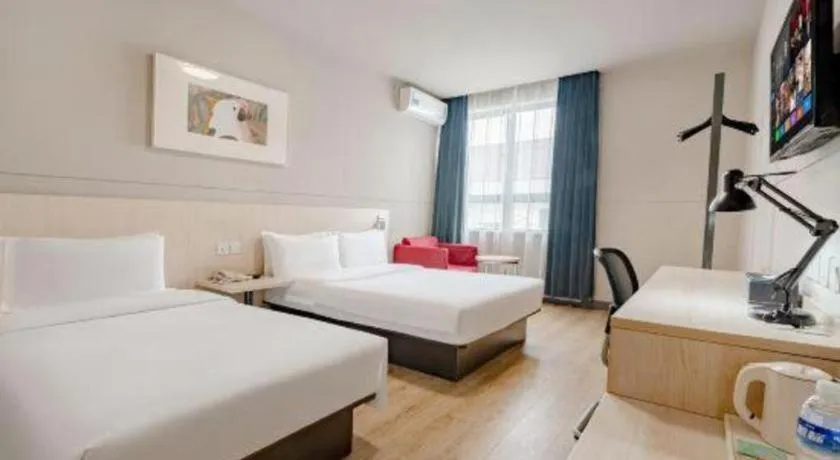 Bed in Jinjiang Inn Shanghai International Tourism and Resorts Zone Kangxin Highway Branch