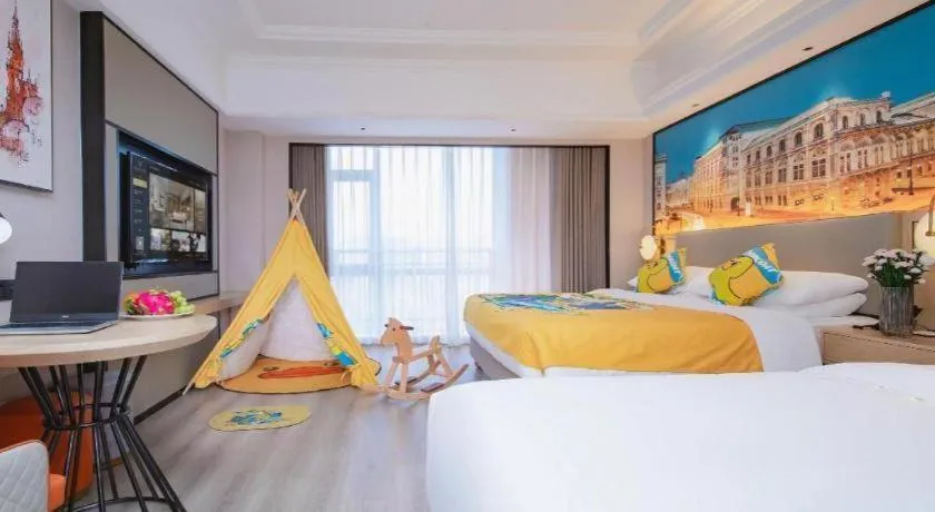 Bed in Vienna International Hotel Wuhan Huanghelou Pengliuyang Metro Station