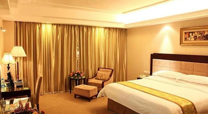 Bed in Vienna International Hotel Wuhan Huanghelou Pengliuyang Metro Station