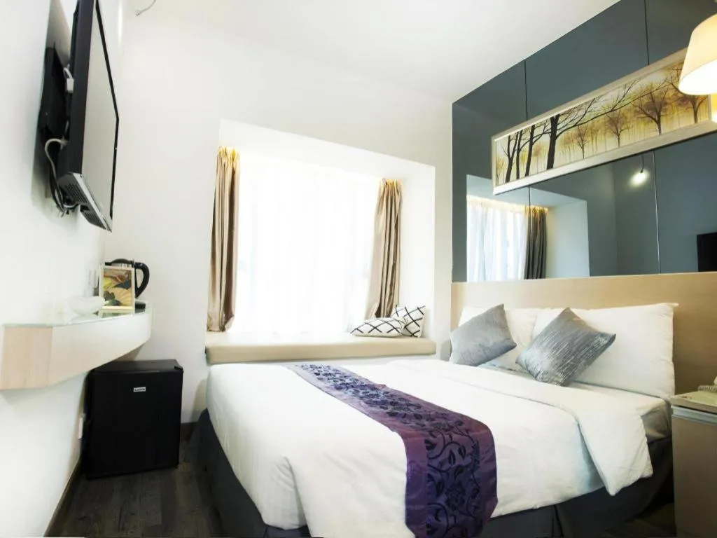 Bed in M1 Yau Ma Tei Hotel