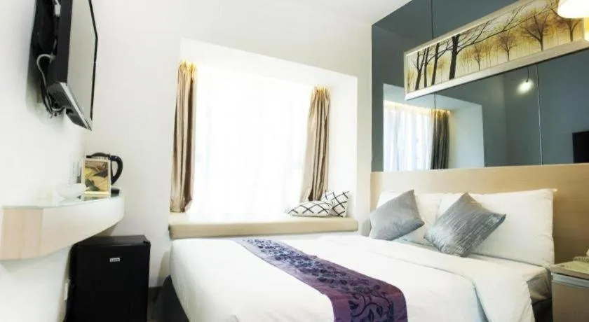 Bed in M1 Yau Ma Tei Hotel