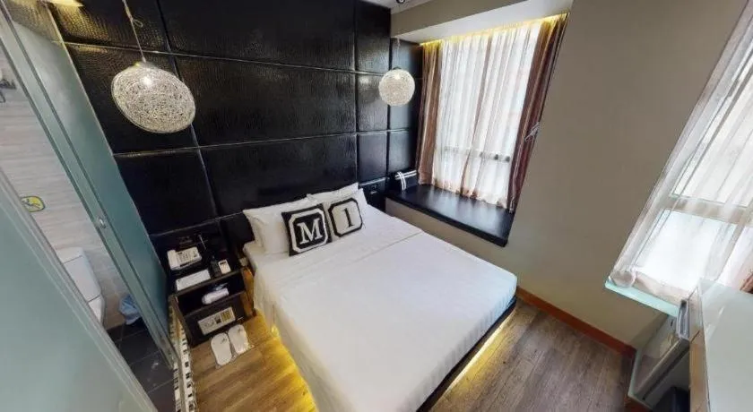 Bed in M1 Yau Ma Tei Hotel