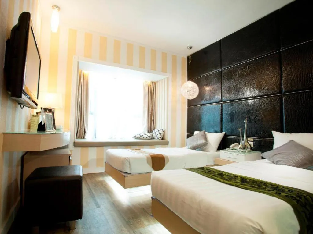 Bed in M1 Yau Ma Tei Hotel