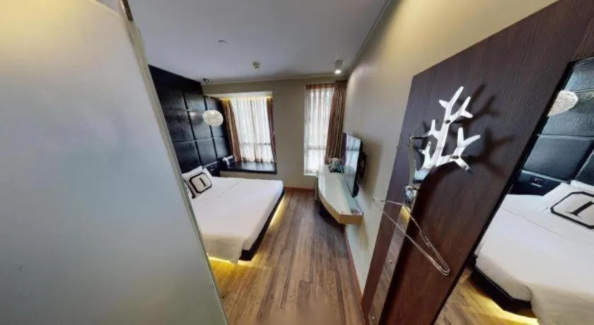 Bed in M1 Yau Ma Tei Hotel