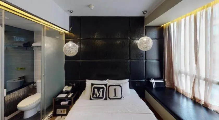 Bed in M1 Yau Ma Tei Hotel