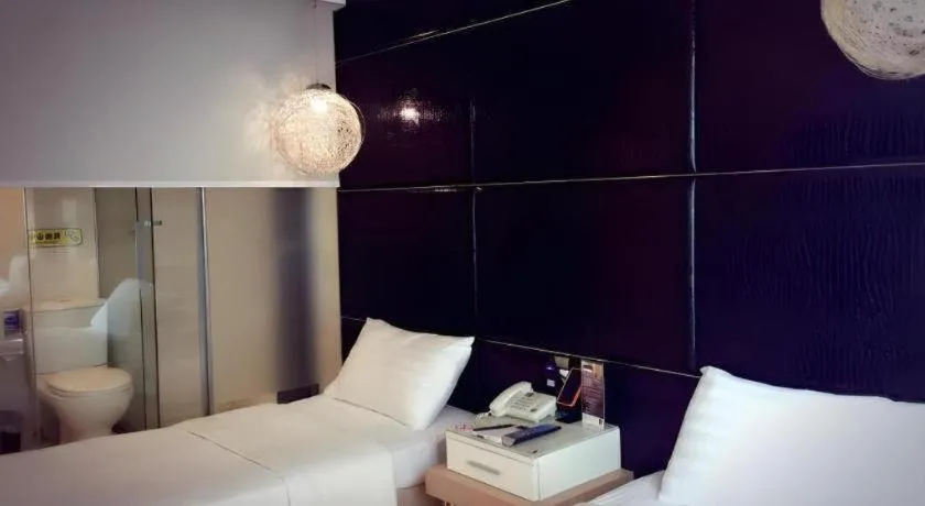 Bed in M1 Yau Ma Tei Hotel