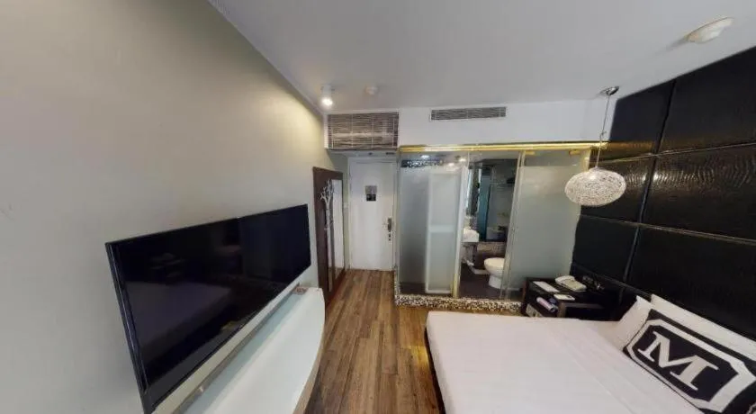 Bed in M1 Yau Ma Tei Hotel