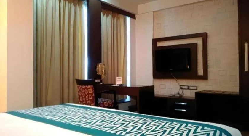 Bed in Hotel Signature Grand