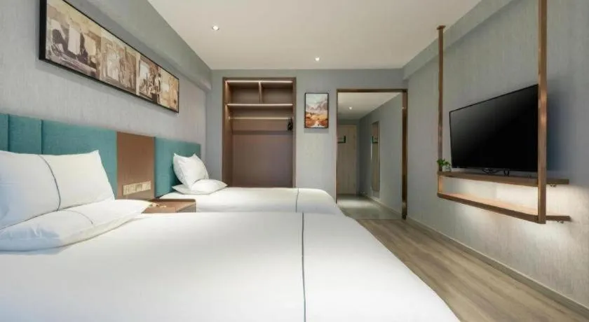 Bed in Jinjiang Inn Tianjin Konggang Branch