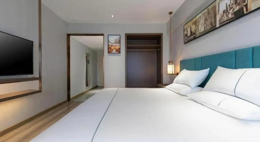 Bed in Jinjiang Inn Tianjin Konggang Branch