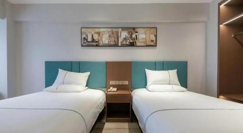 Bed in Jinjiang Inn Tianjin Konggang Branch