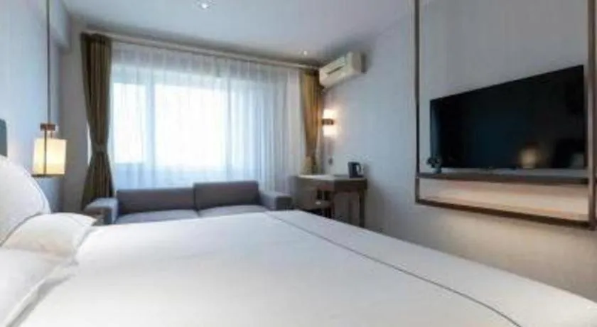 Bed in Jinjiang Inn Tianjin Konggang Branch