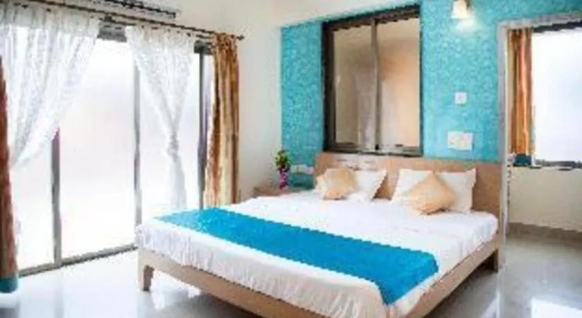 Bed in Palm Air by Goa Signature Stays