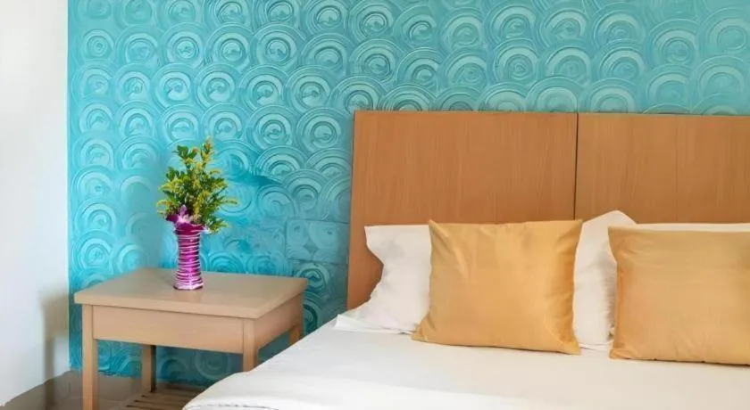 Bed in Palm Air by Goa Signature Stays