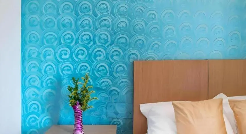 Bed in Palm Air by Goa Signature Stays