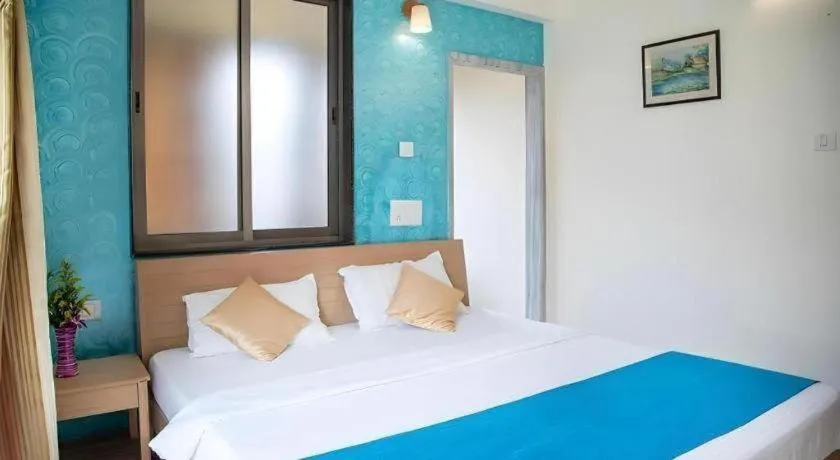 Bed in Palm Air by Goa Signature Stays