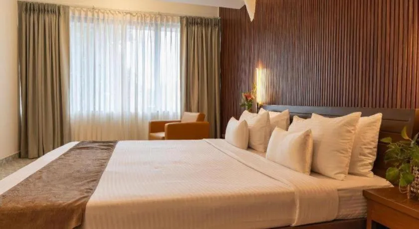 Bed in Palm Air by Goa Signature Stays