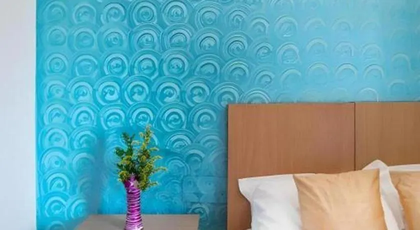 Bed in Palm Air by Goa Signature Stays