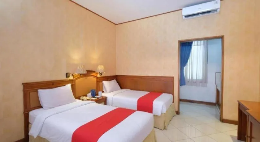 Bed in Diamond Hotel Solo