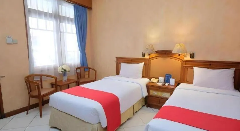 Bed in Diamond Hotel Solo