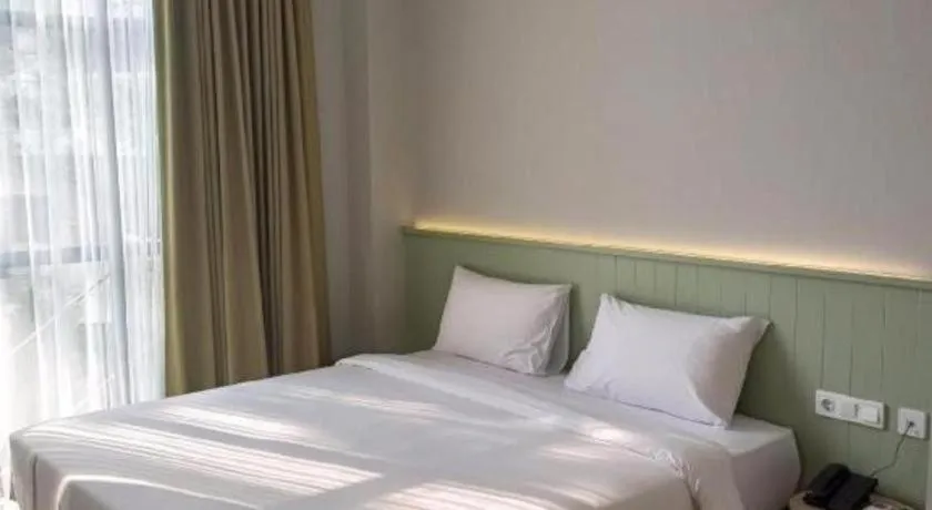 Bed in La Cama Boutique Hotel