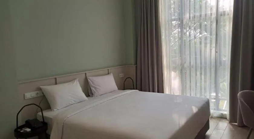 Bed in La Cama Boutique Hotel